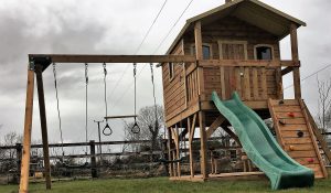 Super sized tree house swings slide climbing rock wall STTSwings