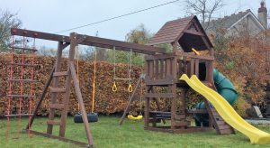 STTSwings featuring spiral tube slide,wave slide and monkey bars.