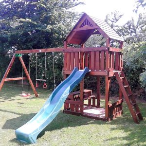 STT Swings climbing frams and playcentres with swings slide rockwall and picnic table with bench