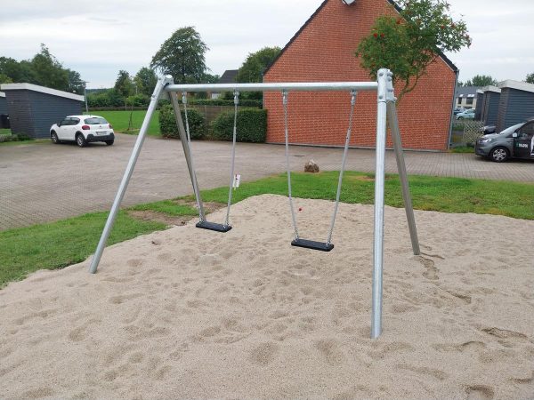 "Double commercial metal swing set with durable galvanized frames, designed for safety and outdoor play.